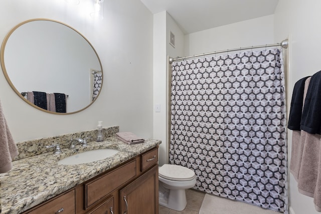 bathroom featuring tile patterned floors, a shower with shower curtain, vanity, and toilet