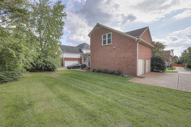 view of property exterior with a garage and a yard