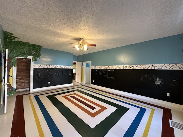 unfurnished bedroom with a textured ceiling