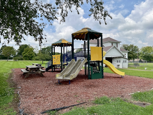 view of playground with a yard