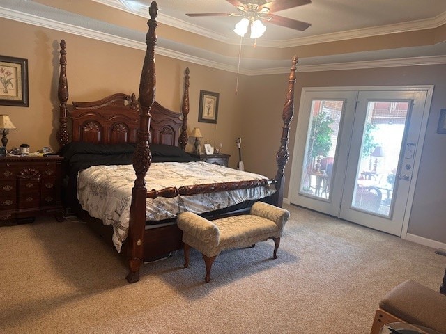 bedroom featuring ceiling fan, ornamental molding, light colored carpet, and access to exterior