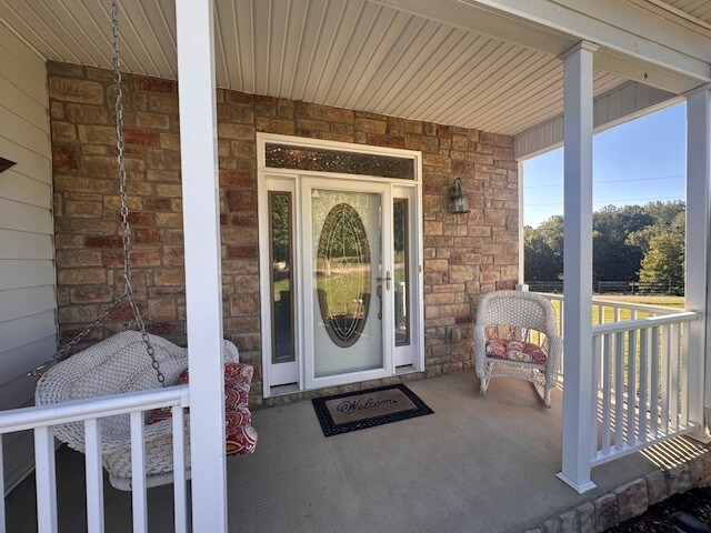 property entrance with a porch