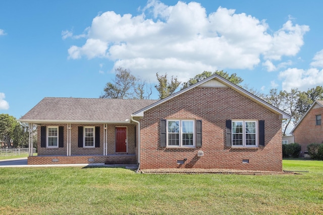 ranch-style home featuring crawl space, a front yard, and brick siding
