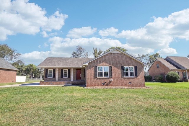 single story home featuring crawl space, a front yard, and brick siding