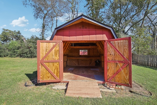 view of outdoor structure featuring a yard