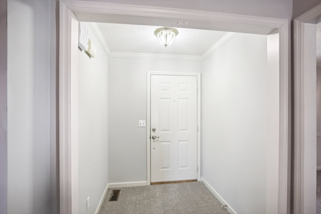 doorway to outside with carpet floors, a textured ceiling, and ornamental molding