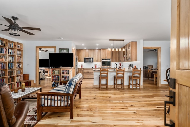 living room with light hardwood / wood-style flooring