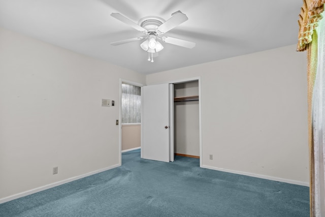 unfurnished bedroom with dark carpet, a closet, and ceiling fan