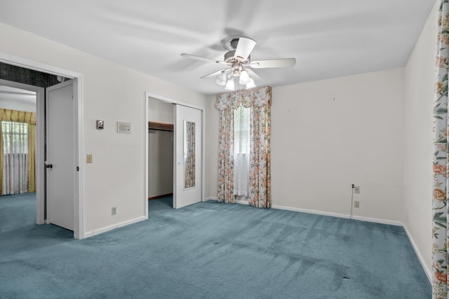 unfurnished bedroom featuring carpet floors, ceiling fan, and a closet