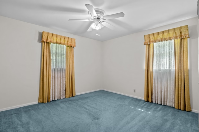 unfurnished room featuring carpet floors and ceiling fan