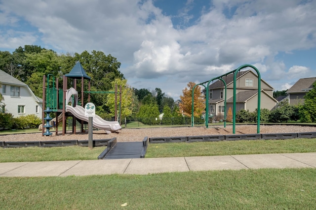 view of jungle gym with a lawn