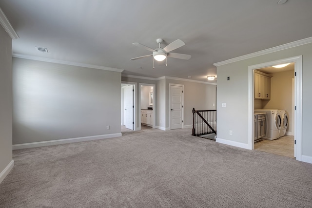 empty room featuring light carpet and ornamental molding