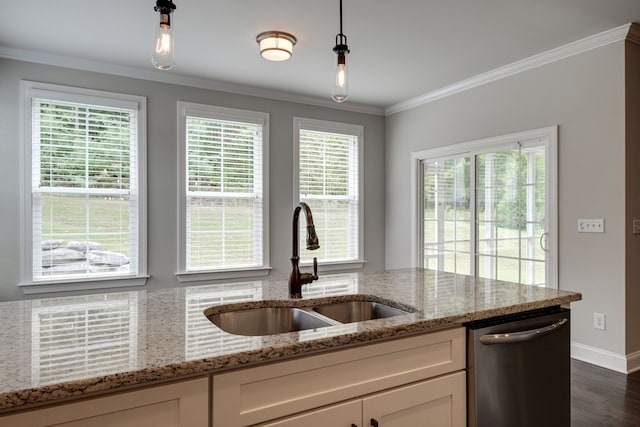 kitchen with pendant lighting, sink, stainless steel dishwasher, white cabinetry, and light stone countertops