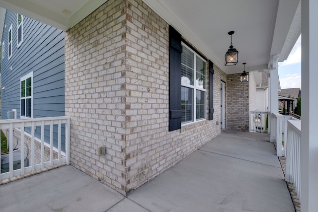 view of property exterior with a porch