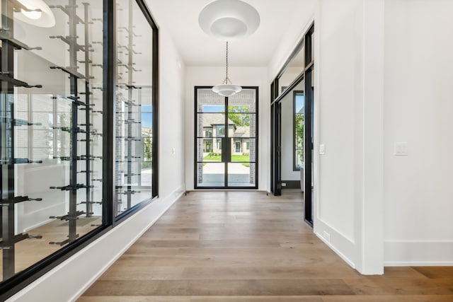 corridor featuring hardwood / wood-style floors