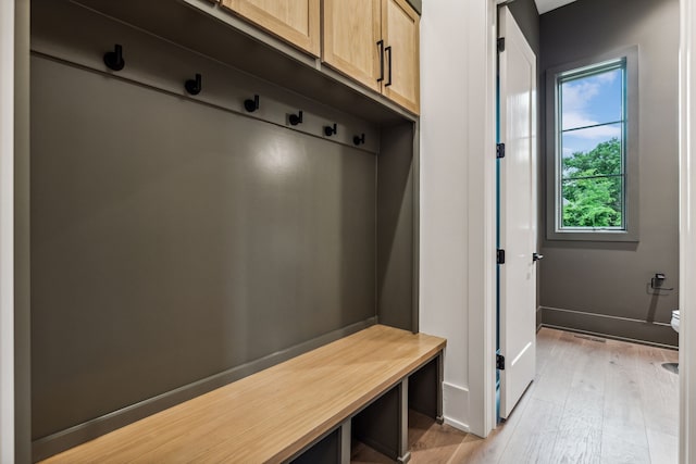 mudroom with light wood-type flooring