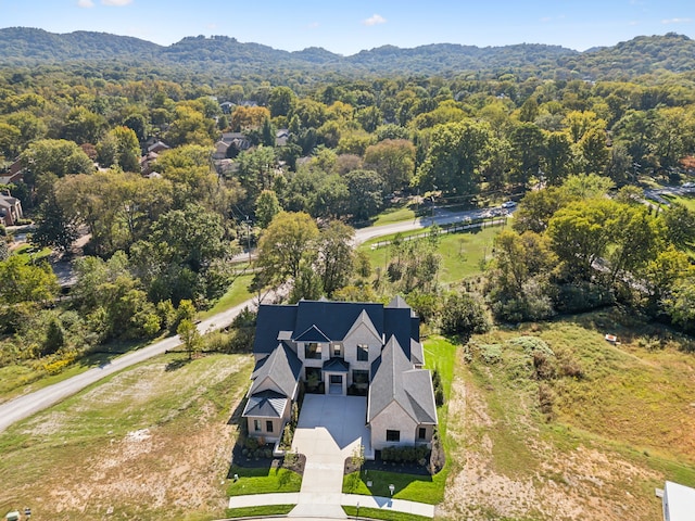 drone / aerial view featuring a mountain view