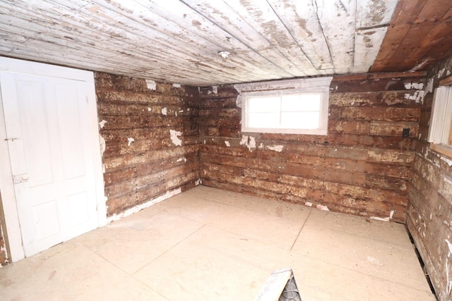 basement featuring wooden ceiling