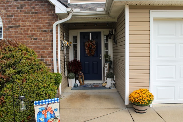 property entrance with a garage