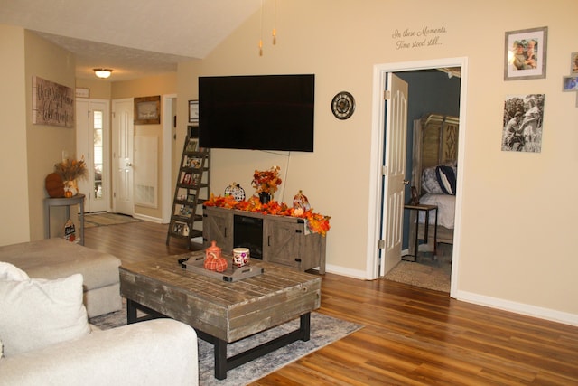 living room featuring dark wood-type flooring