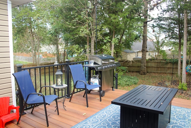 wooden deck with area for grilling