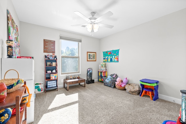 rec room featuring ceiling fan and carpet floors