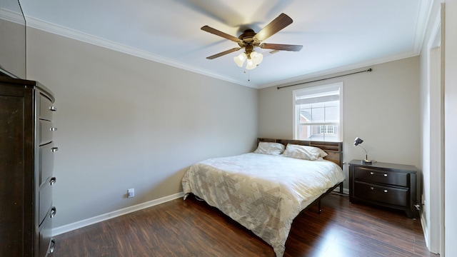 bedroom with ceiling fan, ornamental molding, and dark wood-type flooring