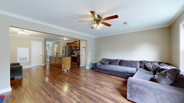 living room featuring crown molding, dark hardwood / wood-style floors, and ceiling fan