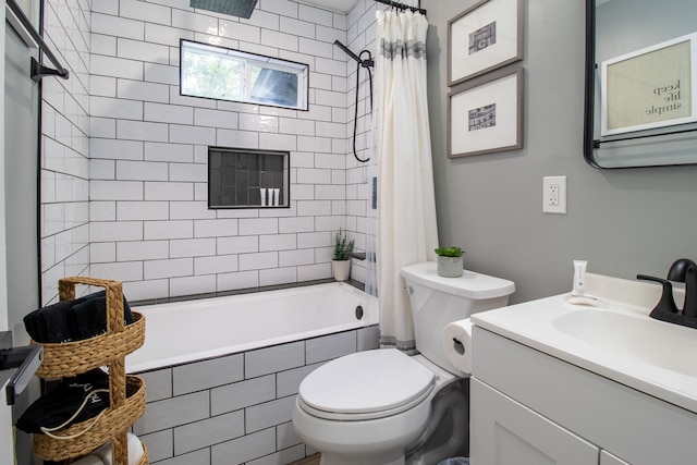 full bathroom with vanity, toilet, and shower / bathtub combination with curtain