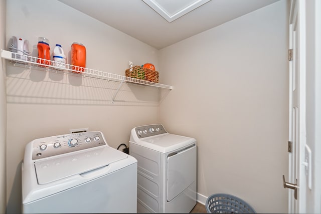 laundry room featuring washer and clothes dryer