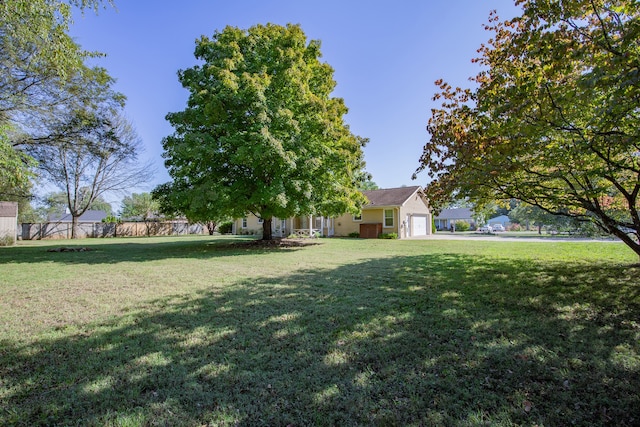 view of yard with a garage