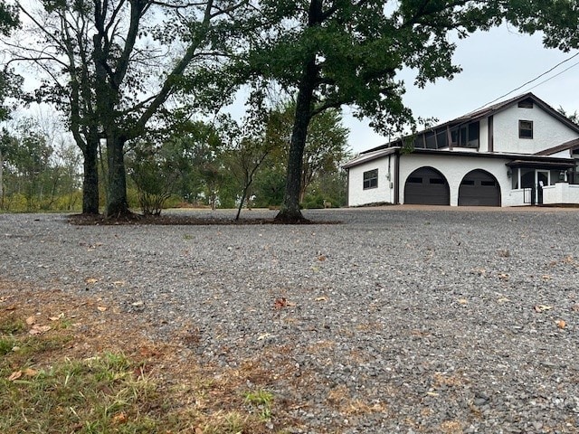 view of yard featuring a garage