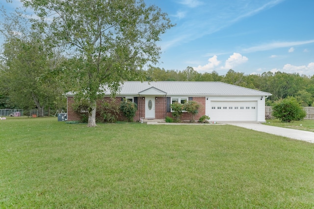 ranch-style house with a garage and a front lawn