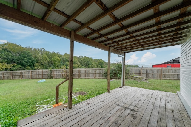 wooden terrace with a yard