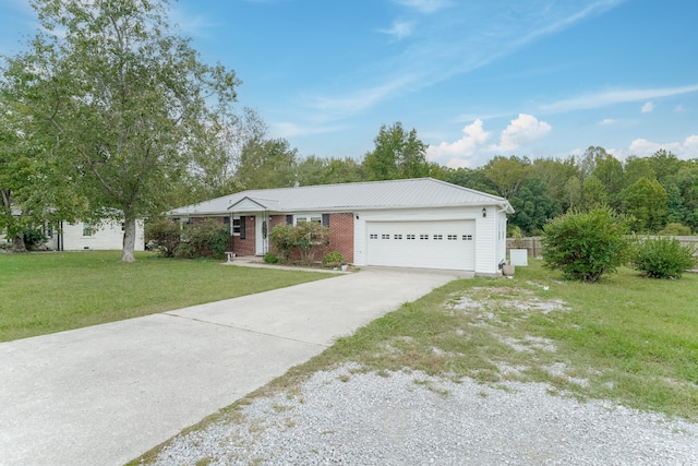 ranch-style home with a garage and a front yard