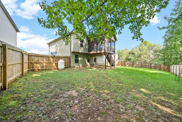 view of yard featuring a sunroom