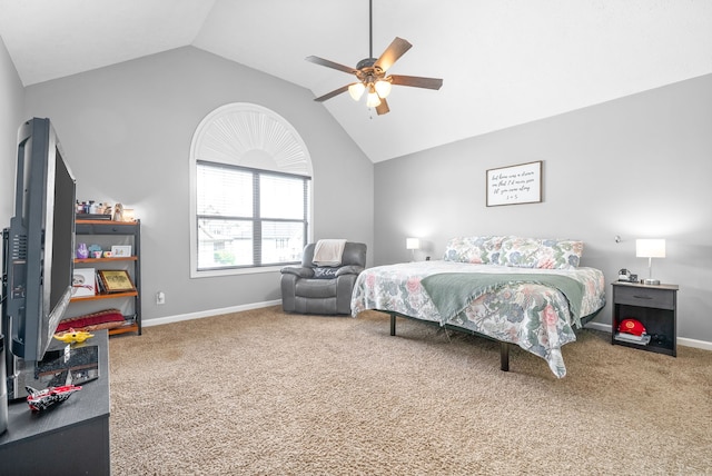 carpeted bedroom with ceiling fan and vaulted ceiling