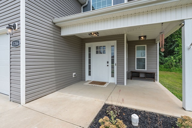 doorway to property featuring a porch