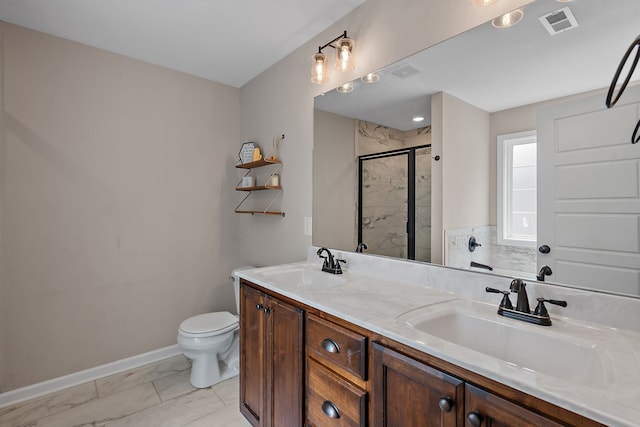 bathroom with walk in shower, vanity, and toilet