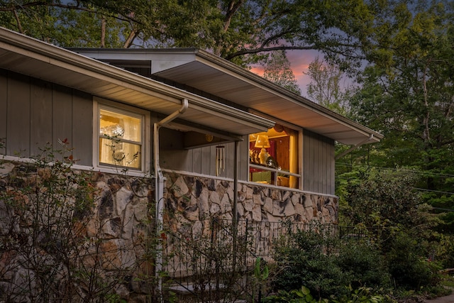 view of property exterior at dusk