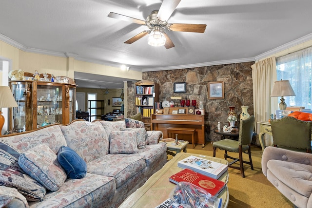 carpeted living room featuring ornamental molding, ceiling fan, and a textured ceiling