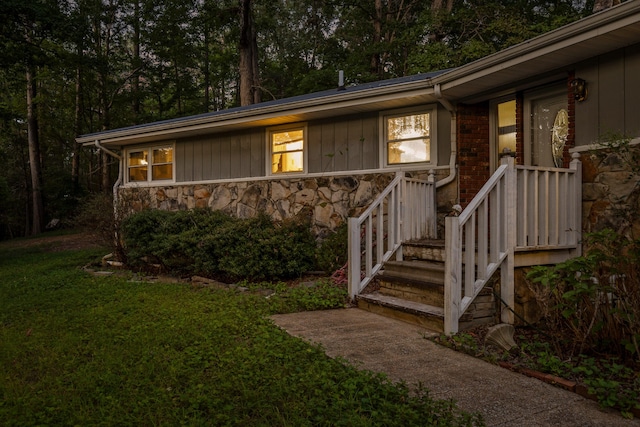 exterior space with a front yard