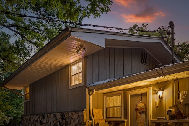 view of property exterior at dusk