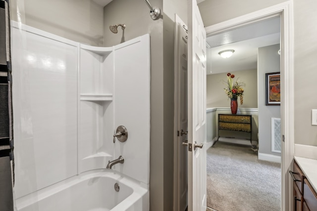 bathroom with shower / bathtub combination and vanity