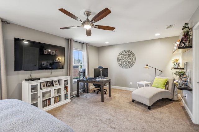 bedroom with ceiling fan and light colored carpet