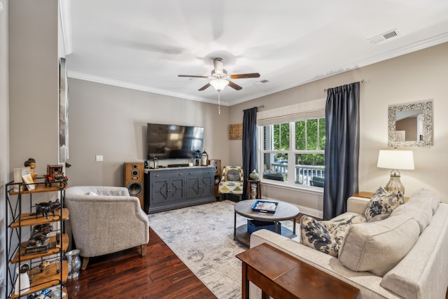 living room featuring ceiling fan, crown molding, and dark hardwood / wood-style flooring