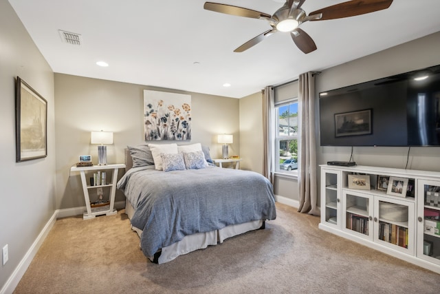 carpeted bedroom featuring ceiling fan