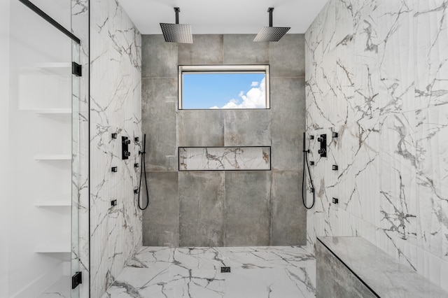 bathroom with tiled shower