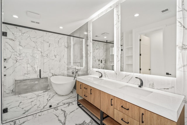 bathroom featuring tile walls, independent shower and bath, and vanity