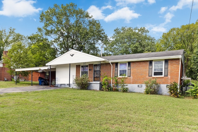 single story home with a carport and a front lawn